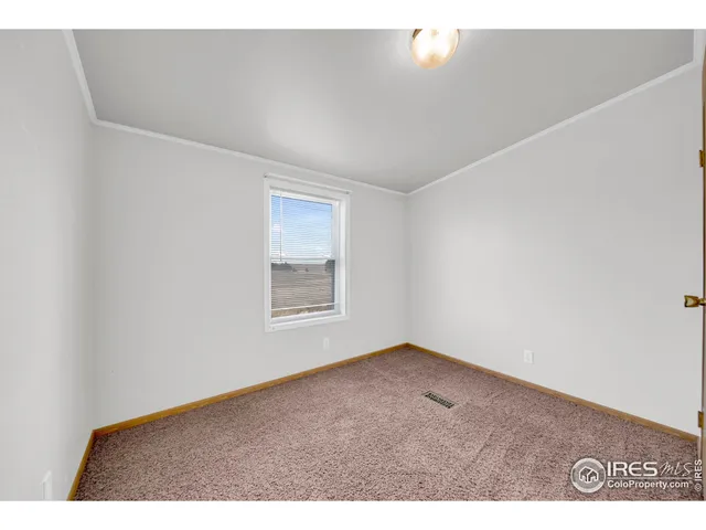 a view of a livingroom with a window