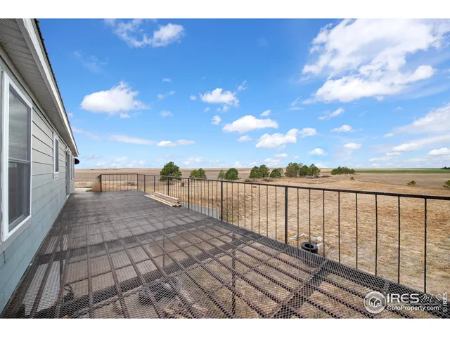 a living room with lots of furniture and a flat screen tv