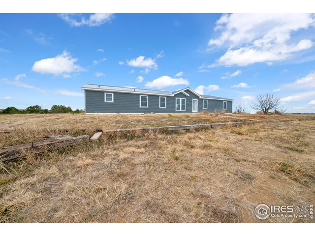 a view of a yard of a house with a yard