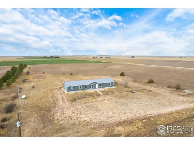 a view of a livingroom with a staircase