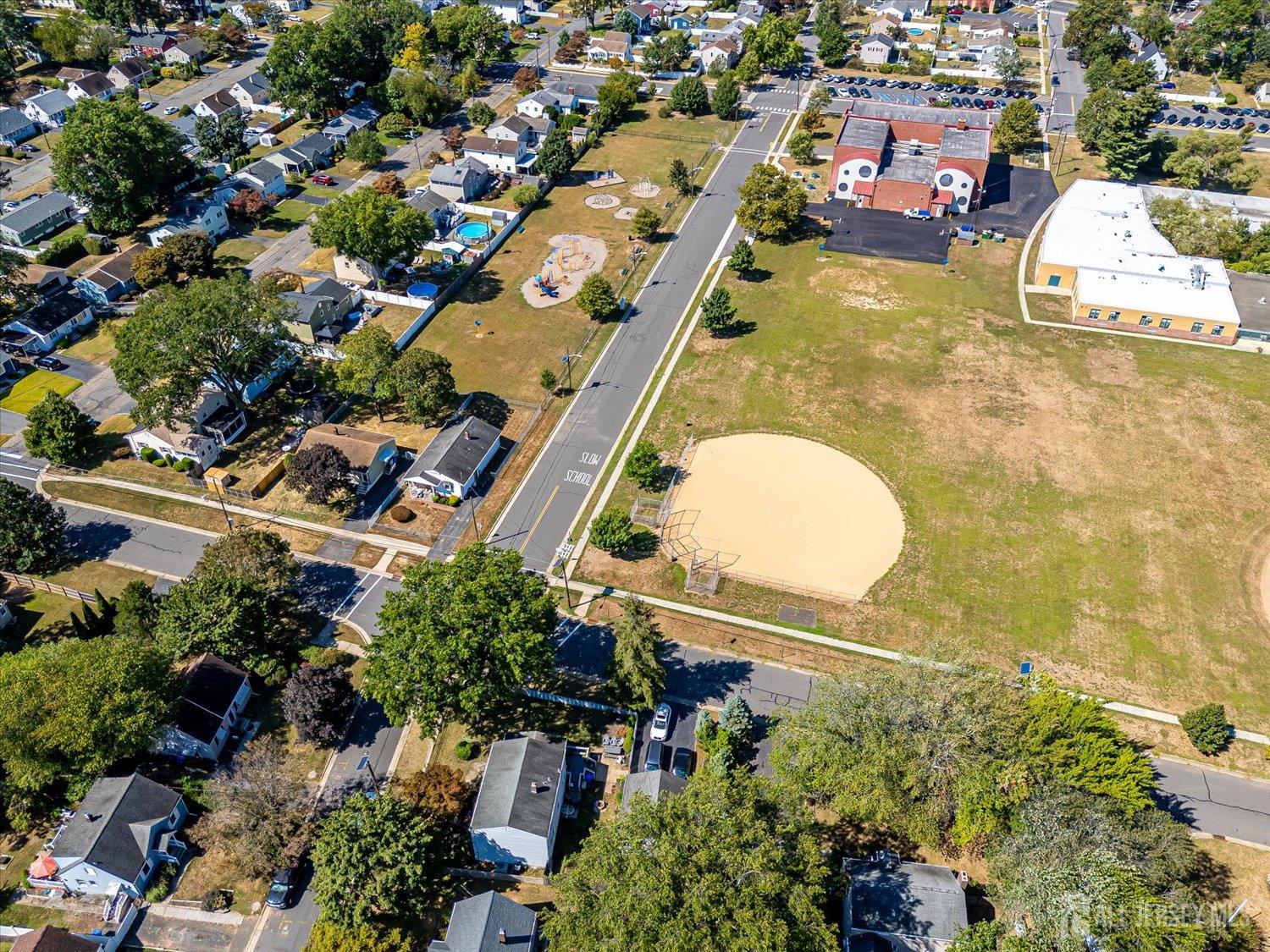 310 Howard Avenue Middlesex, NJ 08846 - Photo 31 of 42 an aerial view of a house with a swimming pool