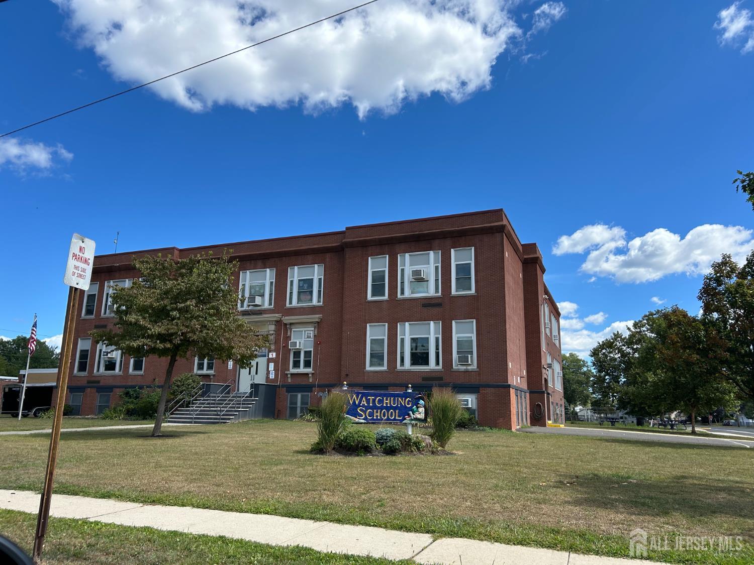310 Howard Avenue Middlesex, NJ 08846 - Photo 35 of 42 a front view of a house with garden