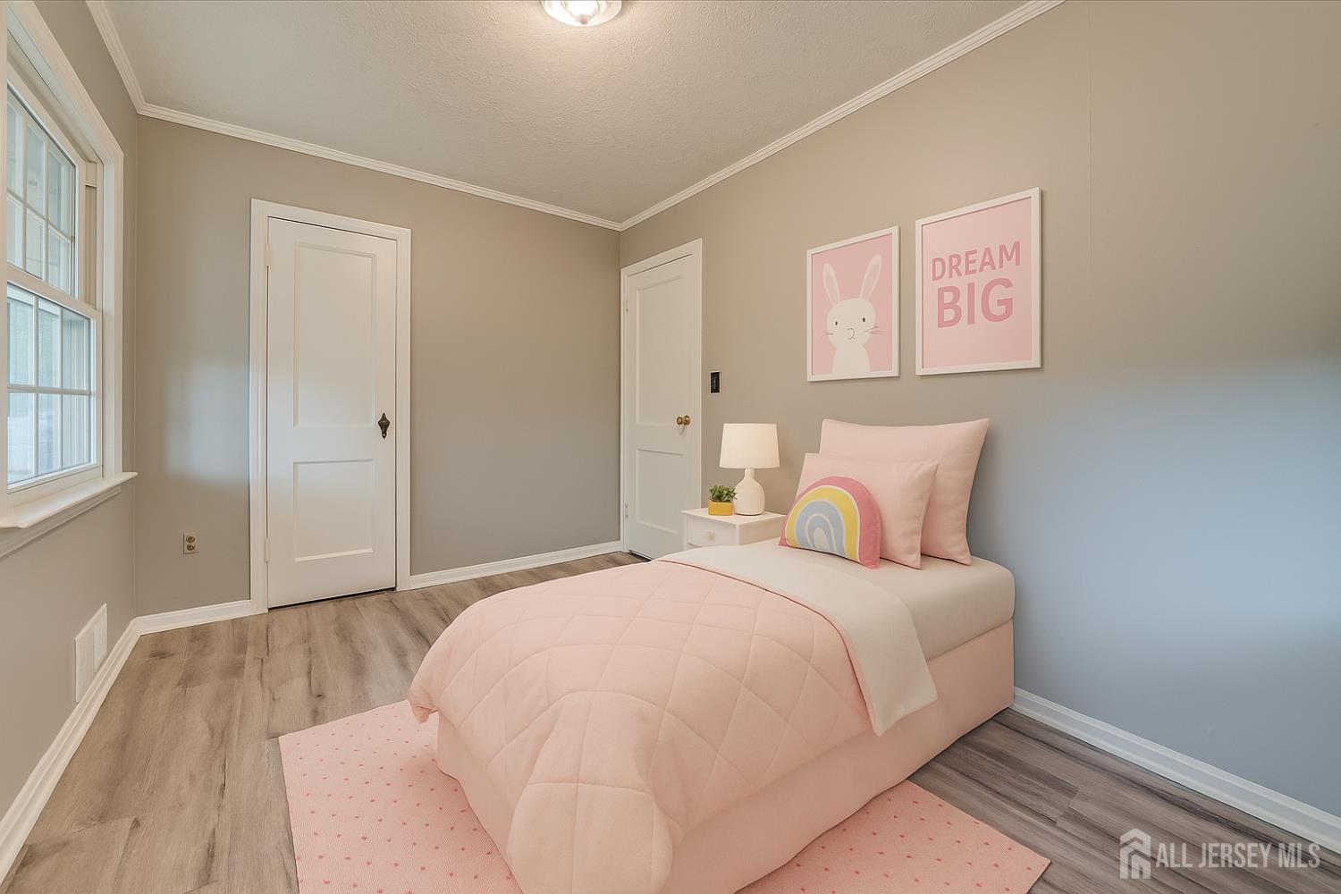 310 Howard Avenue Middlesex, NJ 08846 - Photo 38 of 42 a bedroom with a bed and a window