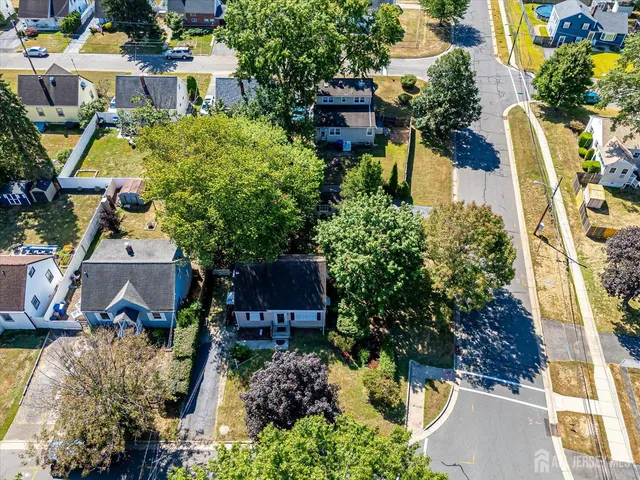 an aerial view of a house with outdoor space