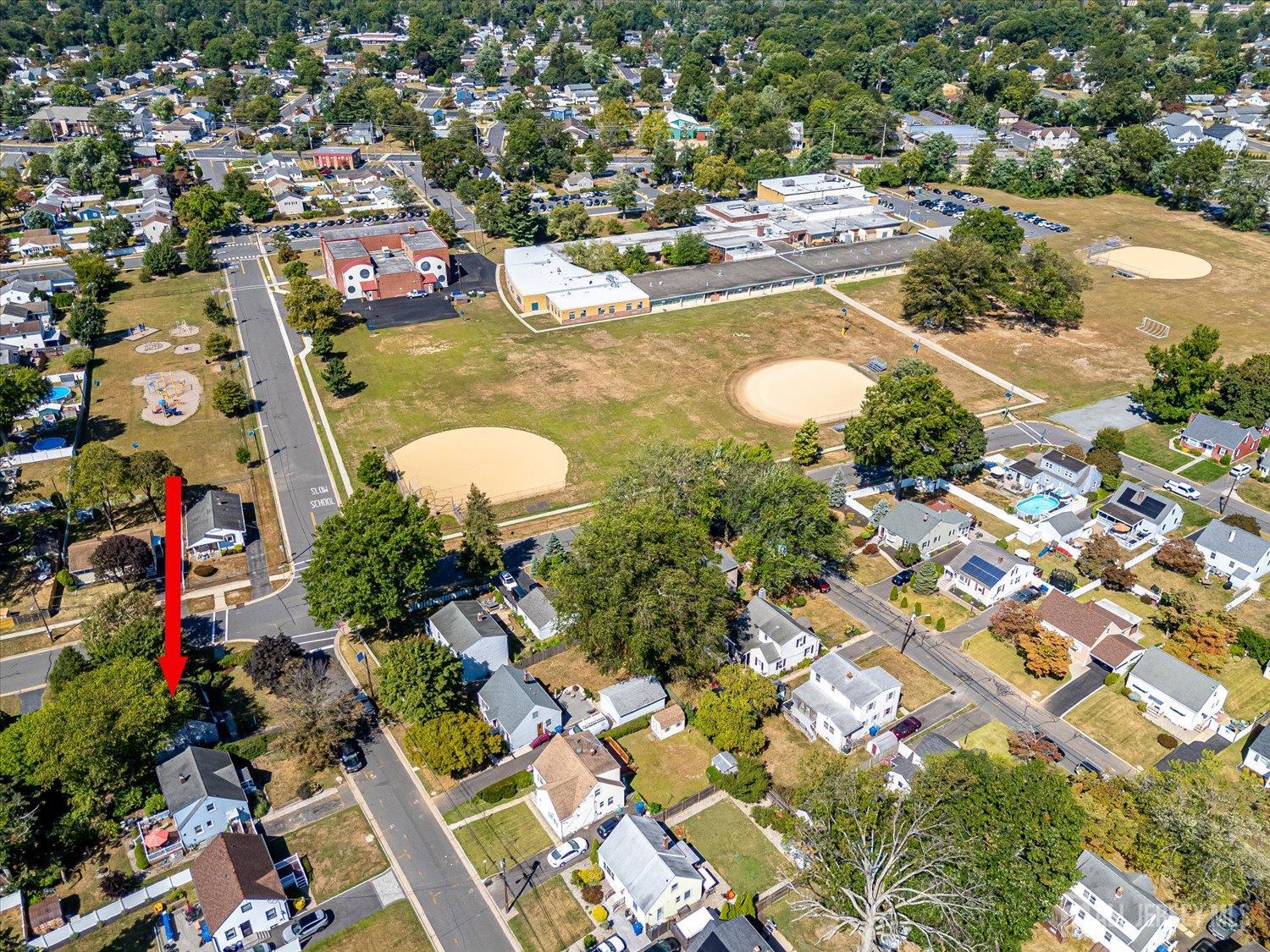310 Howard Avenue Middlesex, NJ 08846 - Photo 8 of 42 an aerial view of residential houses with outdoor space