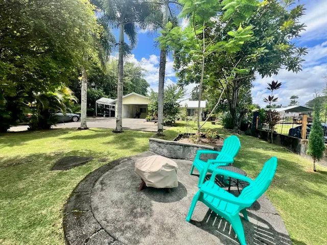 a view of a back yard from a balcony