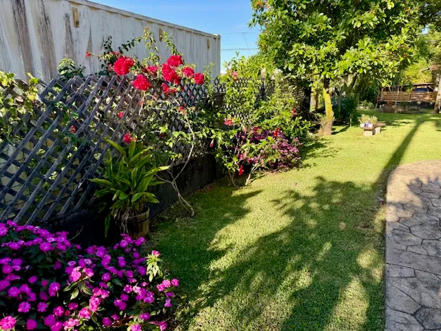 a workspace with wooden floor and window