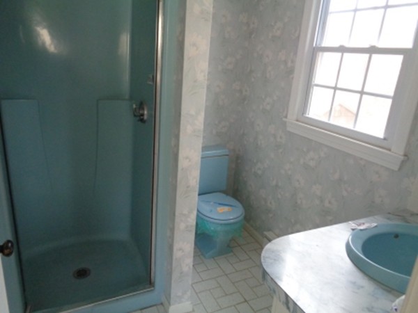 944 Maple Road Longmeadow, MA 01106 - Photo 11 of 11 a bathroom with a toilet and shower