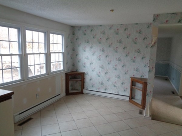 944 Maple Road Longmeadow, MA 01106 - Photo 5 of 11 a view of an empty room and a window