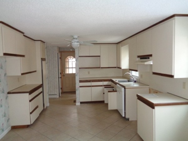 944 Maple Road Longmeadow, MA 01106 - Photo 6 of 11 a kitchen with stainless steel appliances granite countertop a stove a refrigerator and a refrigerator