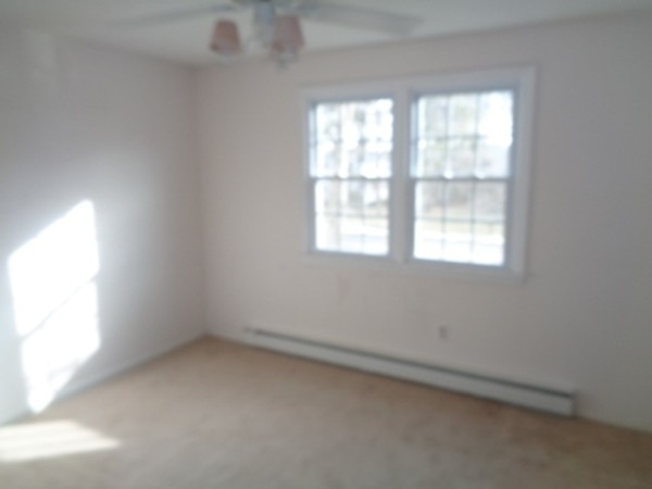 944 Maple Road Longmeadow, MA 01106 - Photo 10 of 11 an empty room with a window