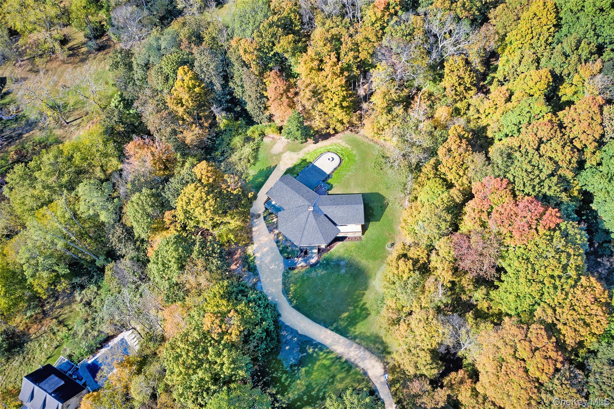 568 Oak Summit Road Millbrook, NY 12545 - Photo 2 of 50 Aerial view of property's location featuring a heavily wooded area