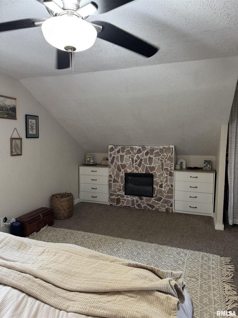 16379 Sand Road Fulton, IL 61252 - Photo 14 of 27 a bedroom with a bed and a chandelier