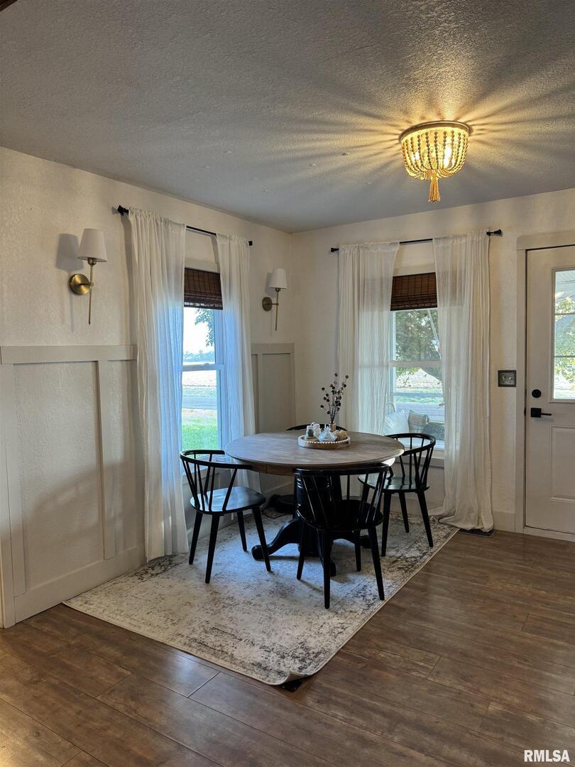 16379 Sand Road Fulton, IL 61252 - Photo 6 of 27 a view of a dining room with furniture and window