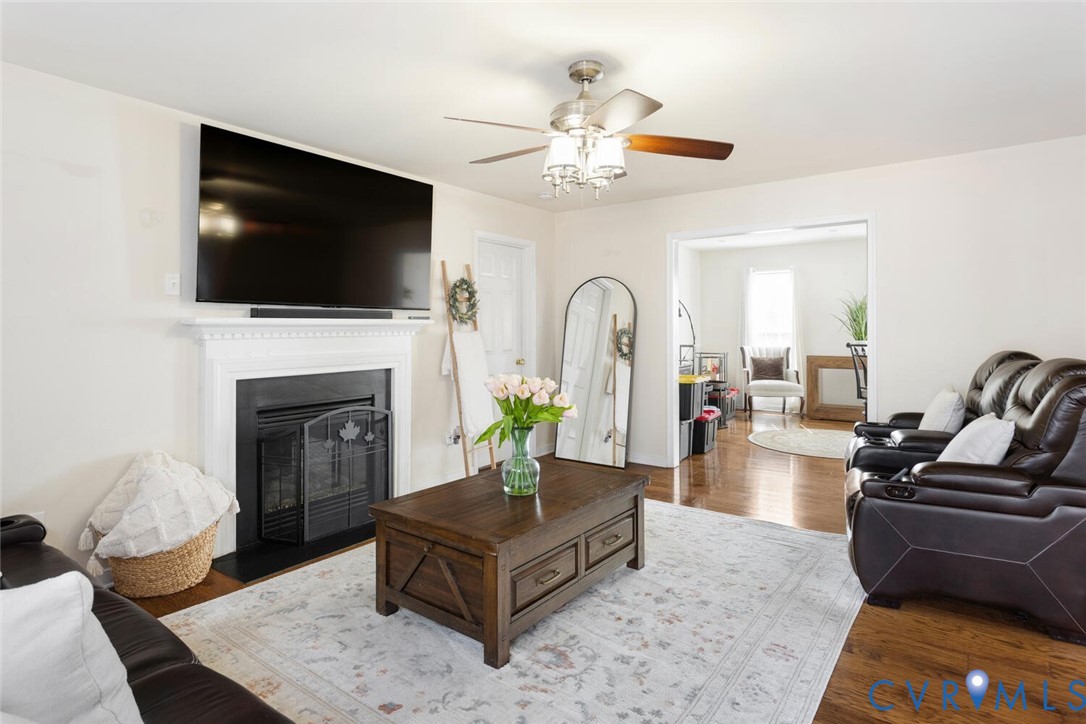 15650 River Road Chesterfield, VA 23838 - Photo 16 of 50 a living room with furniture fireplace and flat screen tv