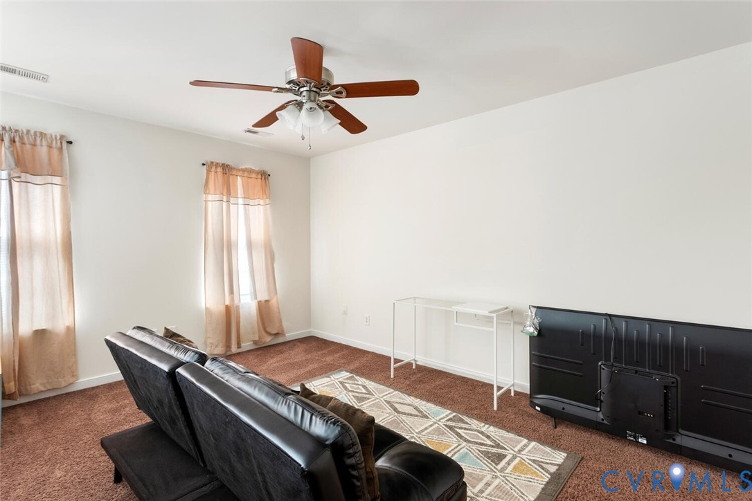 15650 River Road Chesterfield, VA 23838 - Photo 29 of 50 a bedroom with a bed and a window