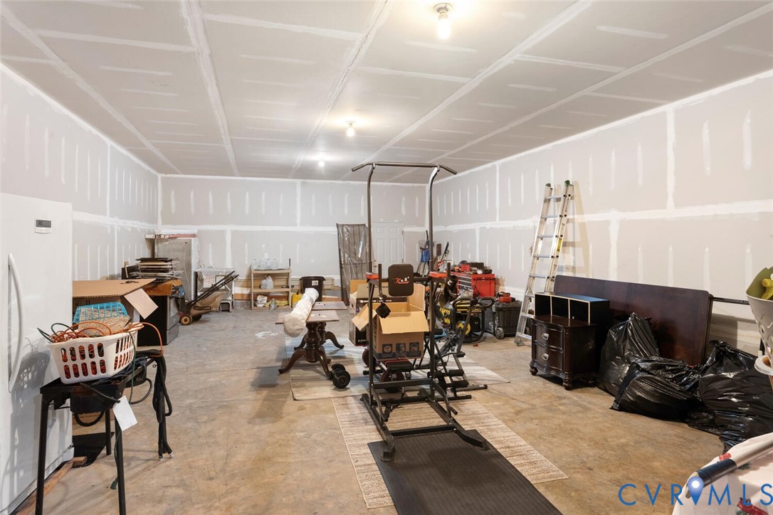 15650 River Road Chesterfield, VA 23838 - Photo 39 of 50 a view of a room with gym equipment and a window