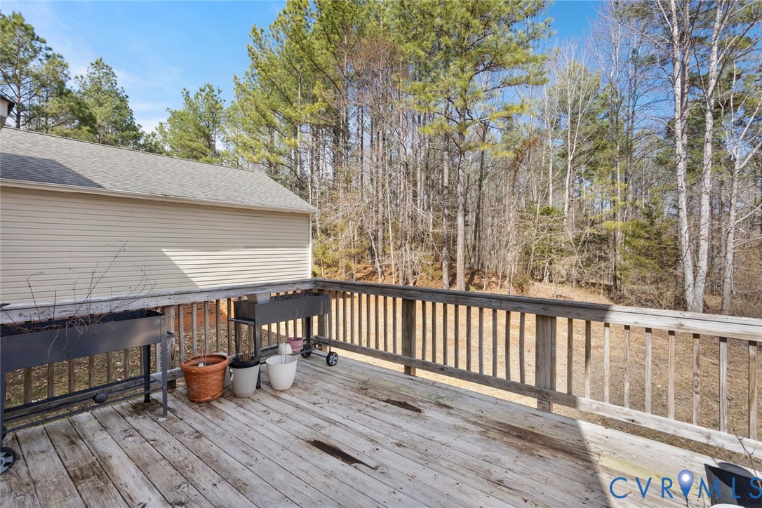 15650 River Road Chesterfield, VA 23838 - Photo 41 of 50 a view of a deck with chairs and wooden floor