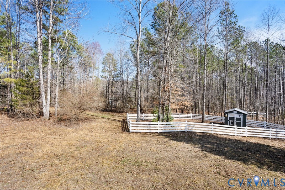 15650 River Road Chesterfield, VA 23838 - Photo 42 of 50 a backyard of a house with lots of green space