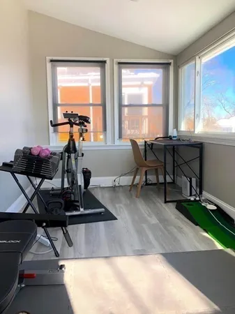 a living room with furniture and window