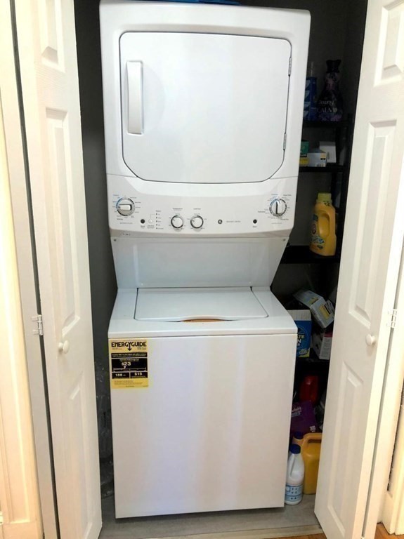 54 Lothrop Street, Unit 54 Newton, MA 02460 - Photo 12 of 13 a utility room with dryer and washer