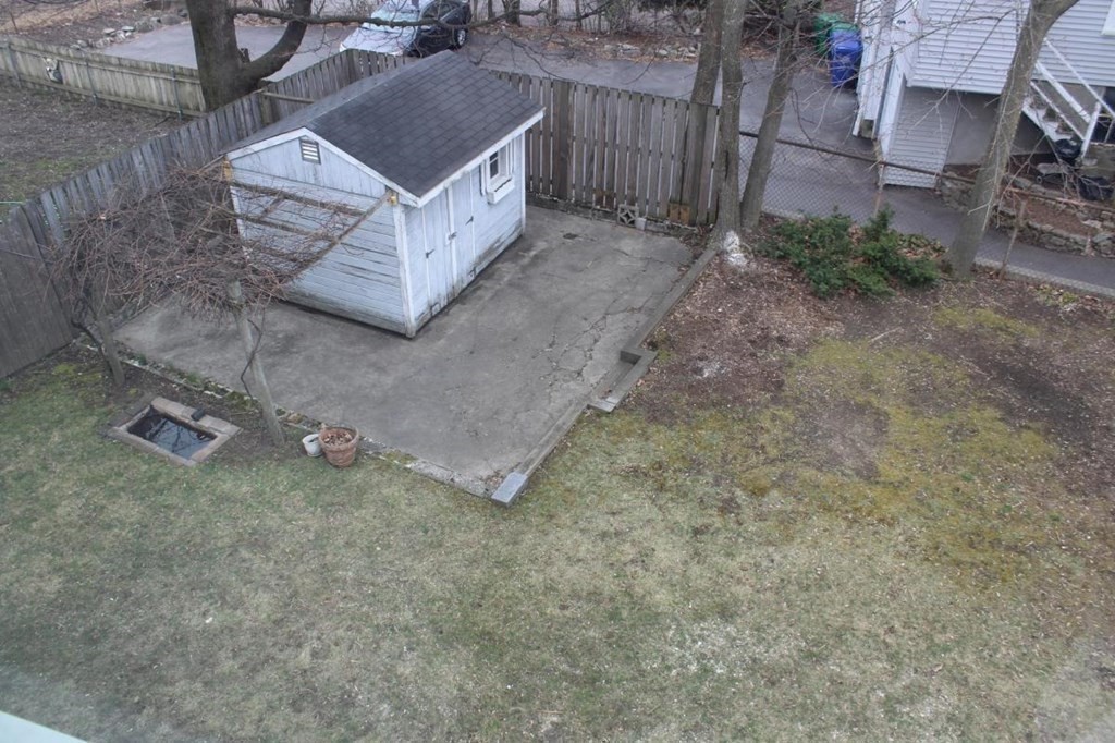 54 Lothrop Street, Unit 54 Newton, MA 02460 - Photo 13 of 13 front view of a house with a yard