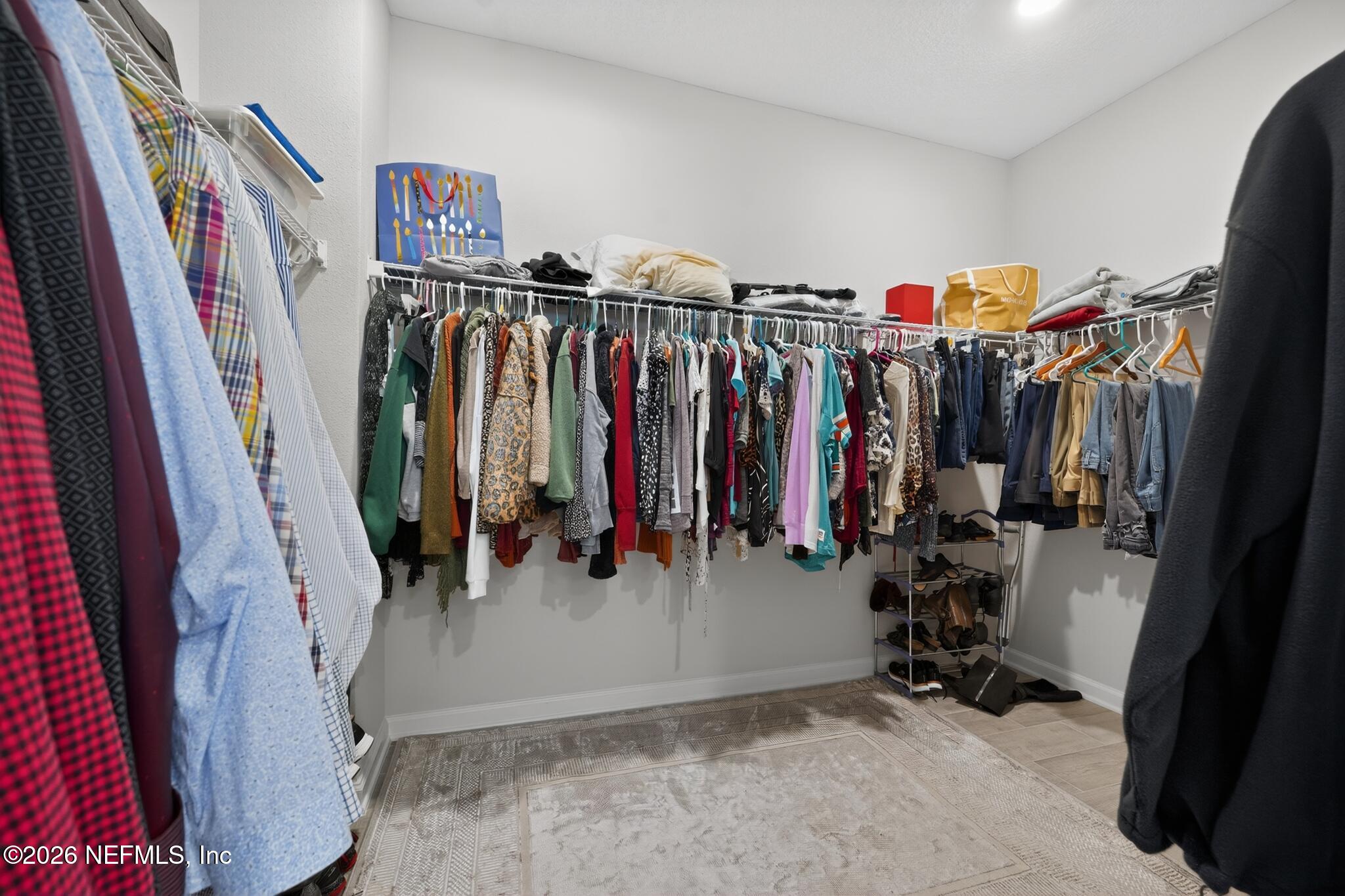 75505 Banyan Way Yulee, FL 32097 - Photo 30 of 30 a view of walk in closet with clothes