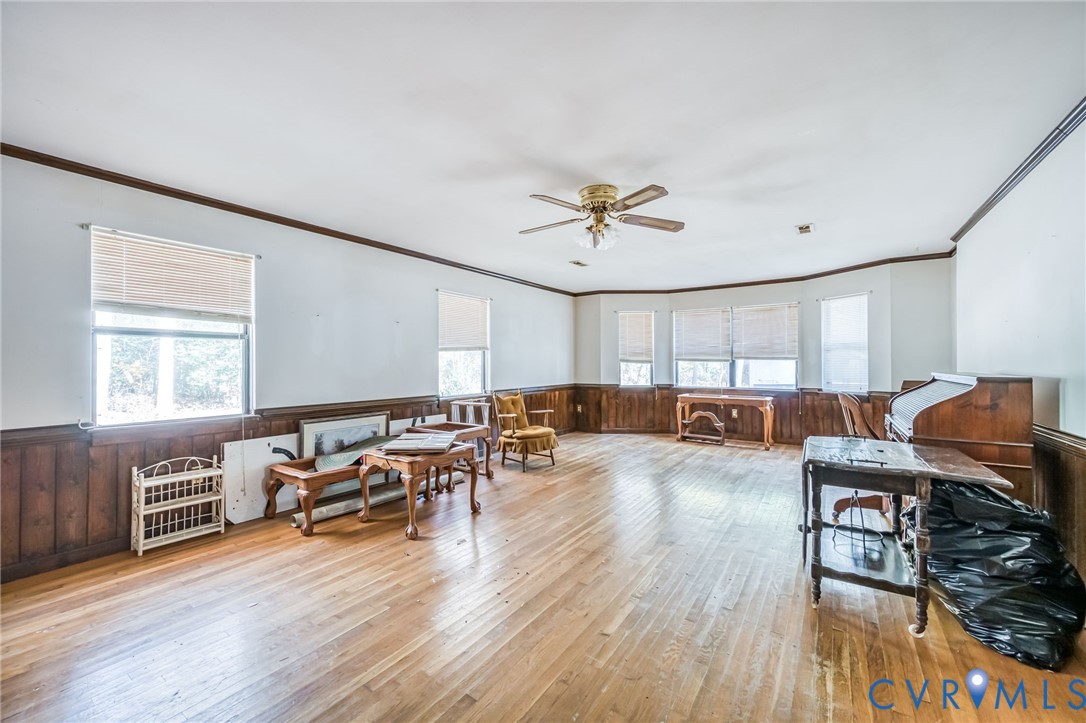 9508 Tranquility Lane Sutherland, VA 23885 - Photo 12 of 20 a living room with furniture and wooden floor