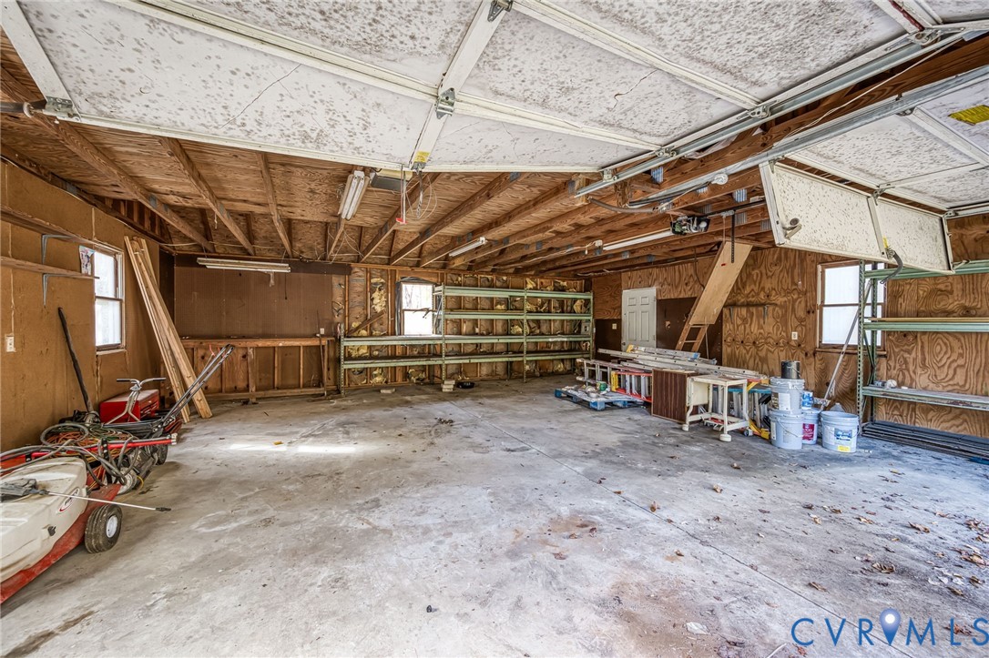 9508 Tranquility Lane Sutherland, VA 23885 - Photo 18 of 20 a view of empty room with wooden ceiling