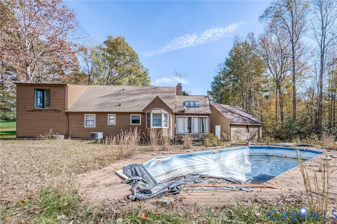9508 Tranquility Lane Sutherland, VA 23885 - Photo 20 of 20 a view of a house with a yard