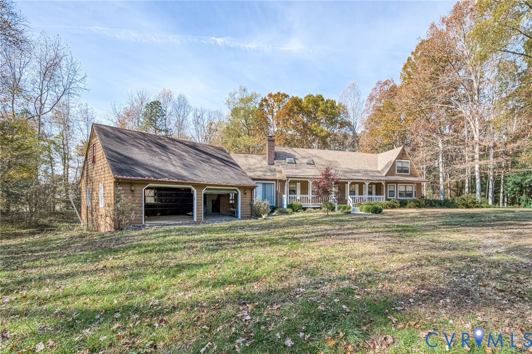 9508 Tranquility Lane Sutherland, VA 23885 - Photo 2 of 20 a front view of a house with a yard