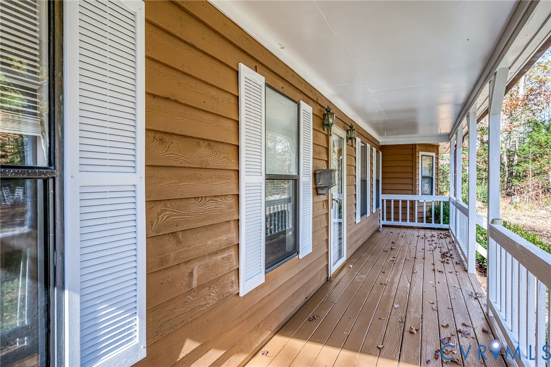 9508 Tranquility Lane Sutherland, VA 23885 - Photo 4 of 20 a view of balcony with wooden floor