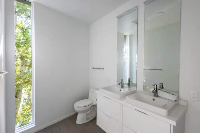 a view of a storage & utility room with wooden floor