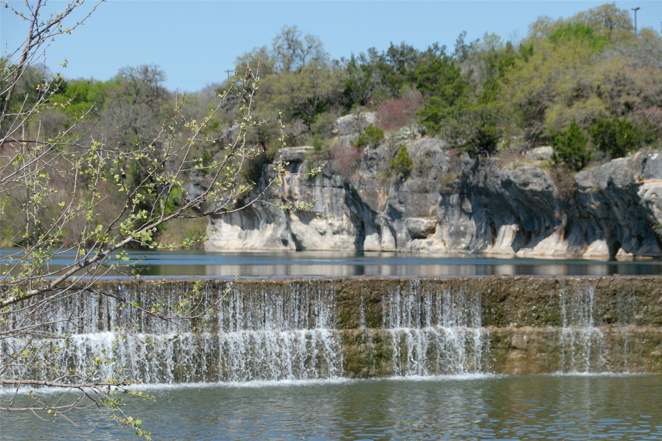 1309 Sunset Hill Way Georgetown, TX 78628 - Photo 5 of 16 a view of a lake with a house