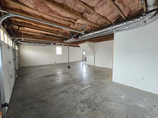 a view of a room with racks on the wall