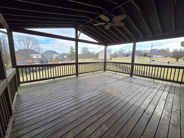 a view of outdoor space with wooden floor