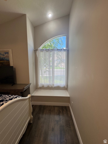 1976 River Bottom Road Springville, UT 84663 - Photo 28 of 45 Arched window with a built-in window seat, wood-finish flooring, recessed lighting, and vaulted ceilings