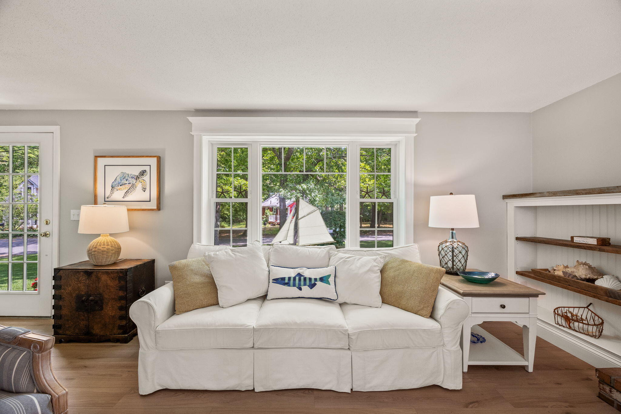 111 Richardson Road Centerville, MA 02632 - Photo 12 of 48 a living room with furniture and a large window