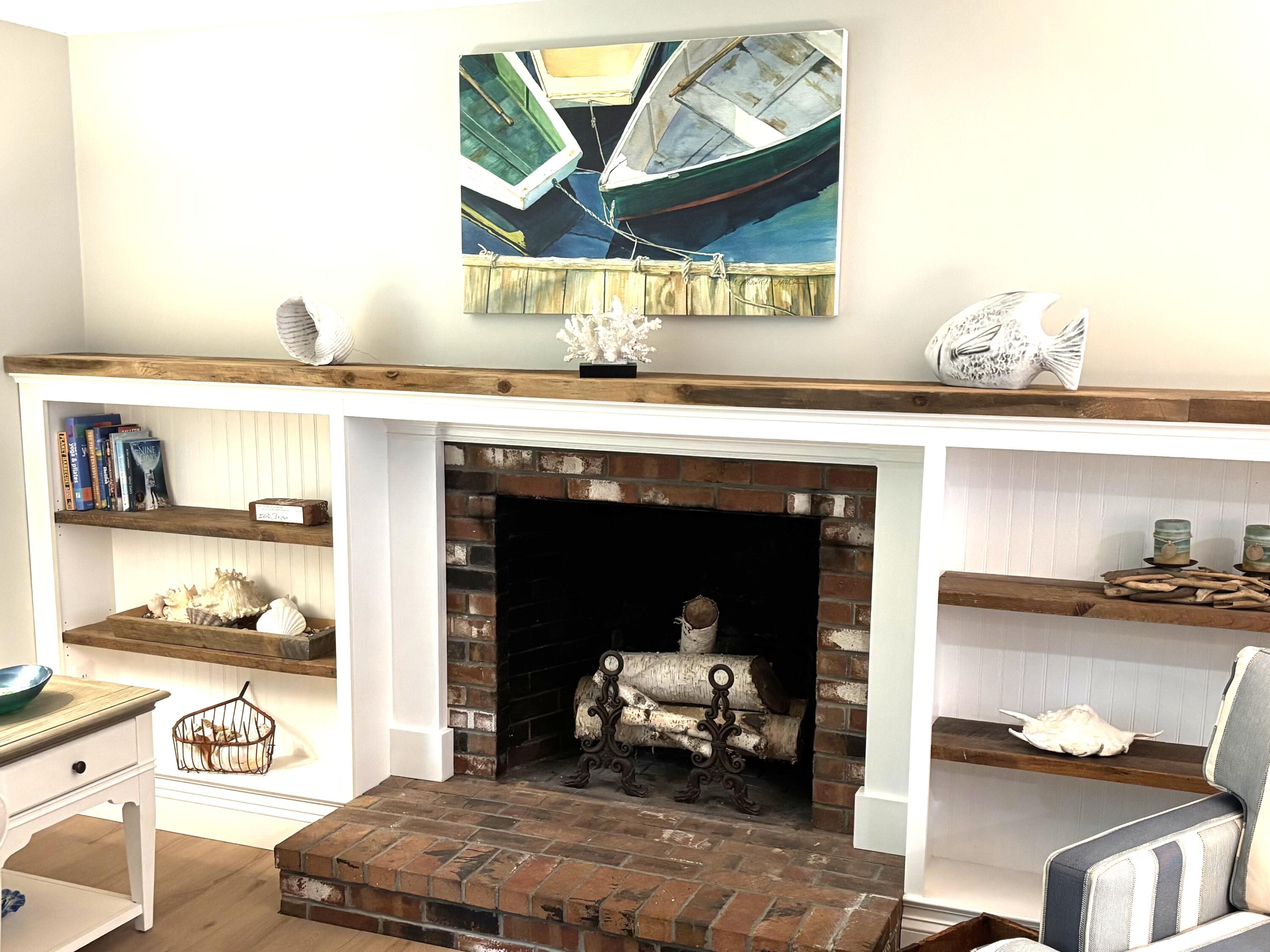 111 Richardson Road Centerville, MA 02632 - Photo 13 of 48 a living room with furniture and a fireplace