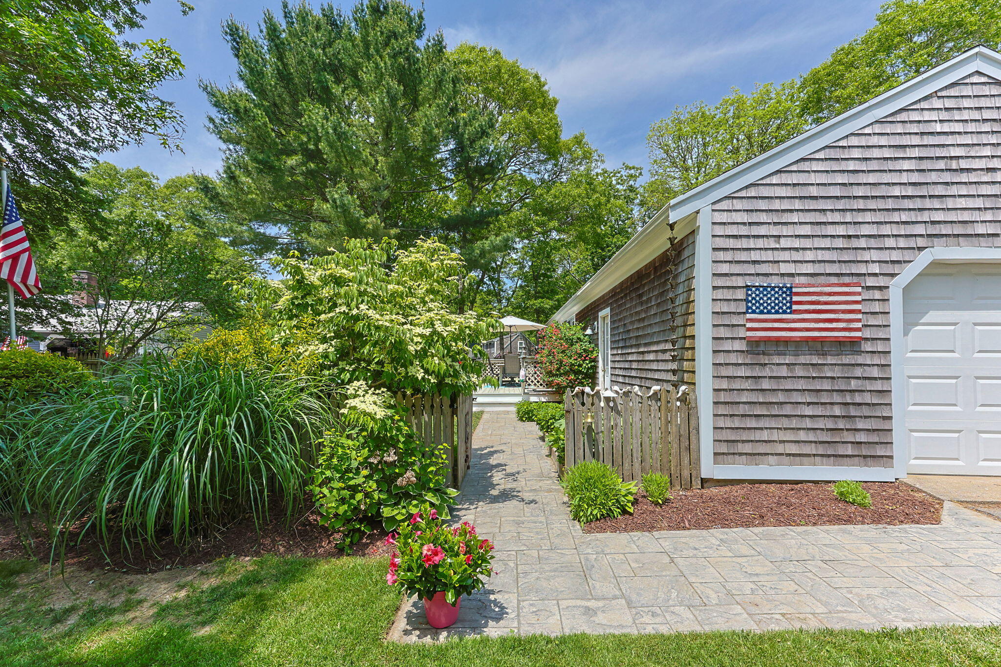 111 Richardson Road Centerville, MA 02632 - Photo 36 of 48 a backyard of a house with lots of green space
