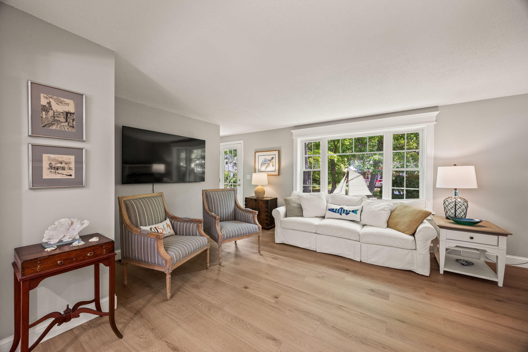 111 Richardson Road Centerville, MA 02632 - Photo 9 of 48 a living room with furniture and a flat screen tv