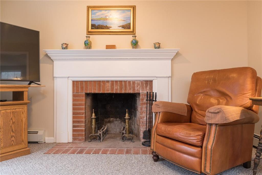 6 Westwoods Road Kennebunk, ME 04043 - Photo 8 of 34 The family room's wood burning...