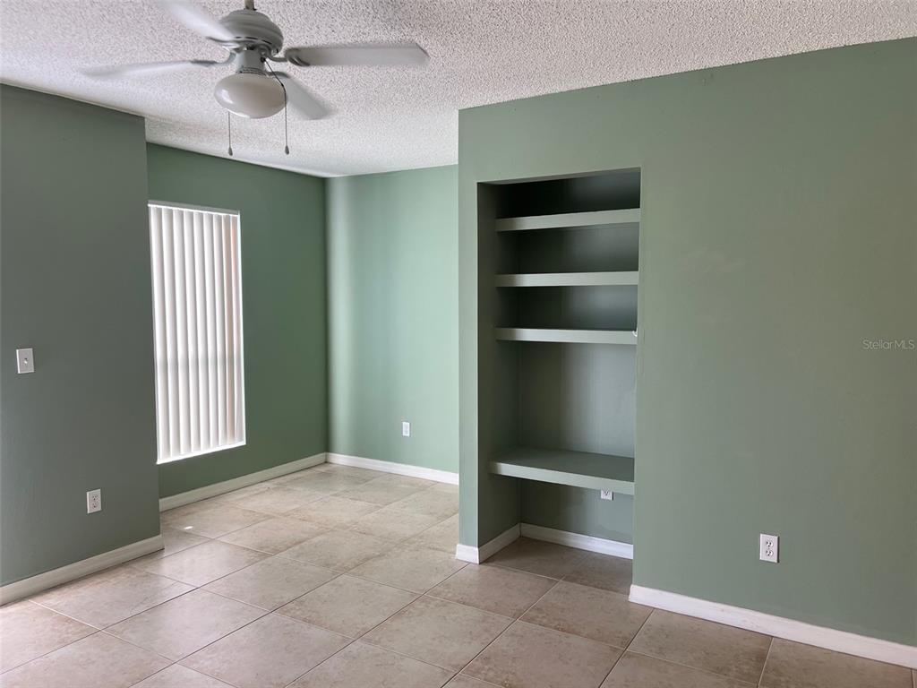 455 Alt 19, Unit 159 Palm Harbor, FL 34683 - Photo 6 of 26 a view of an empty room with a window