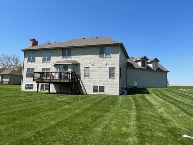 10902 Zarnstorff Road Richmond, IL 60071 - Photo 2 of 14 a view of a house with a backyard