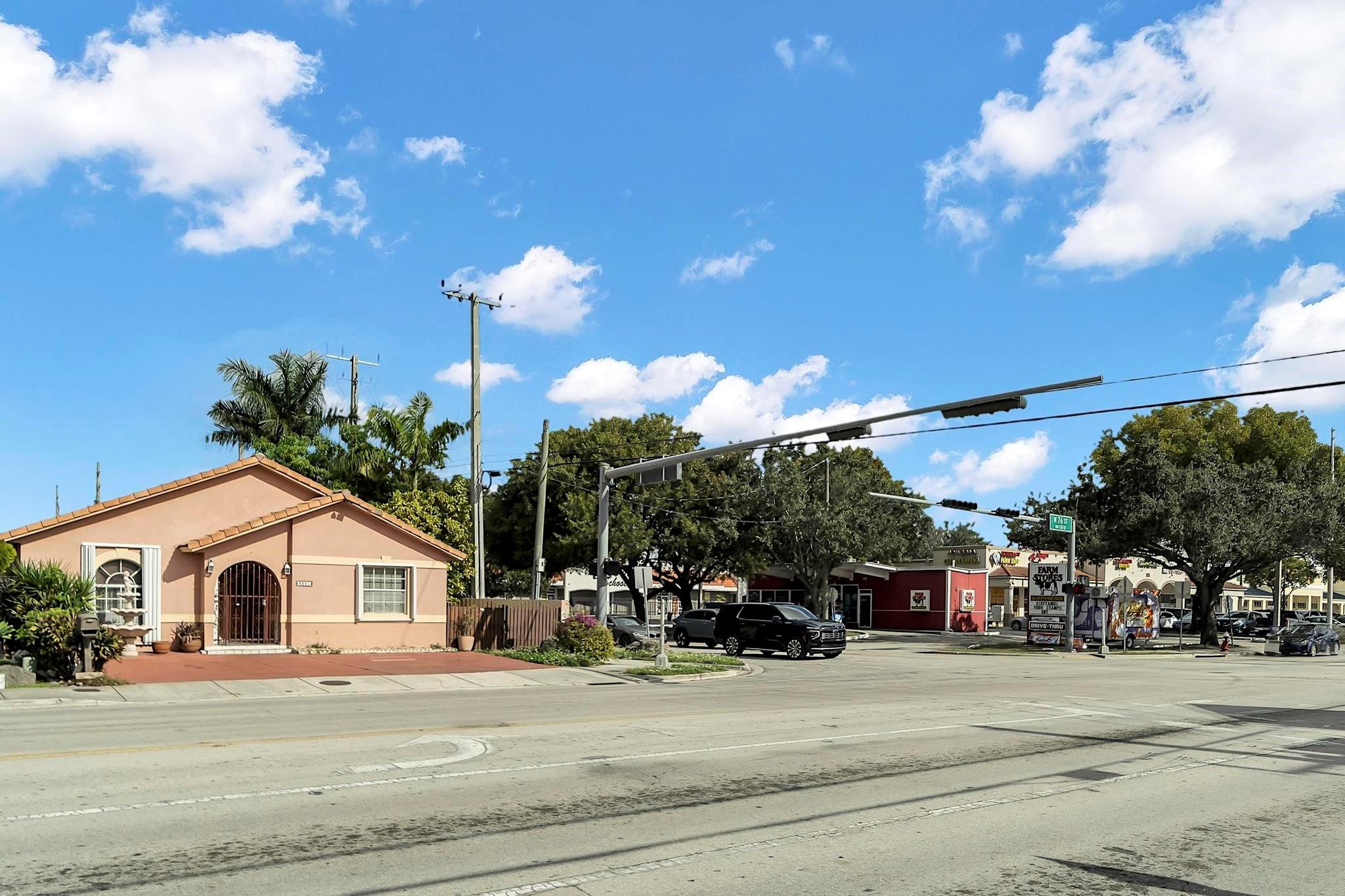 3201 West 76th Street Hialeah, FL 33018 - Photo 4 of 46 a view of a house with a yard