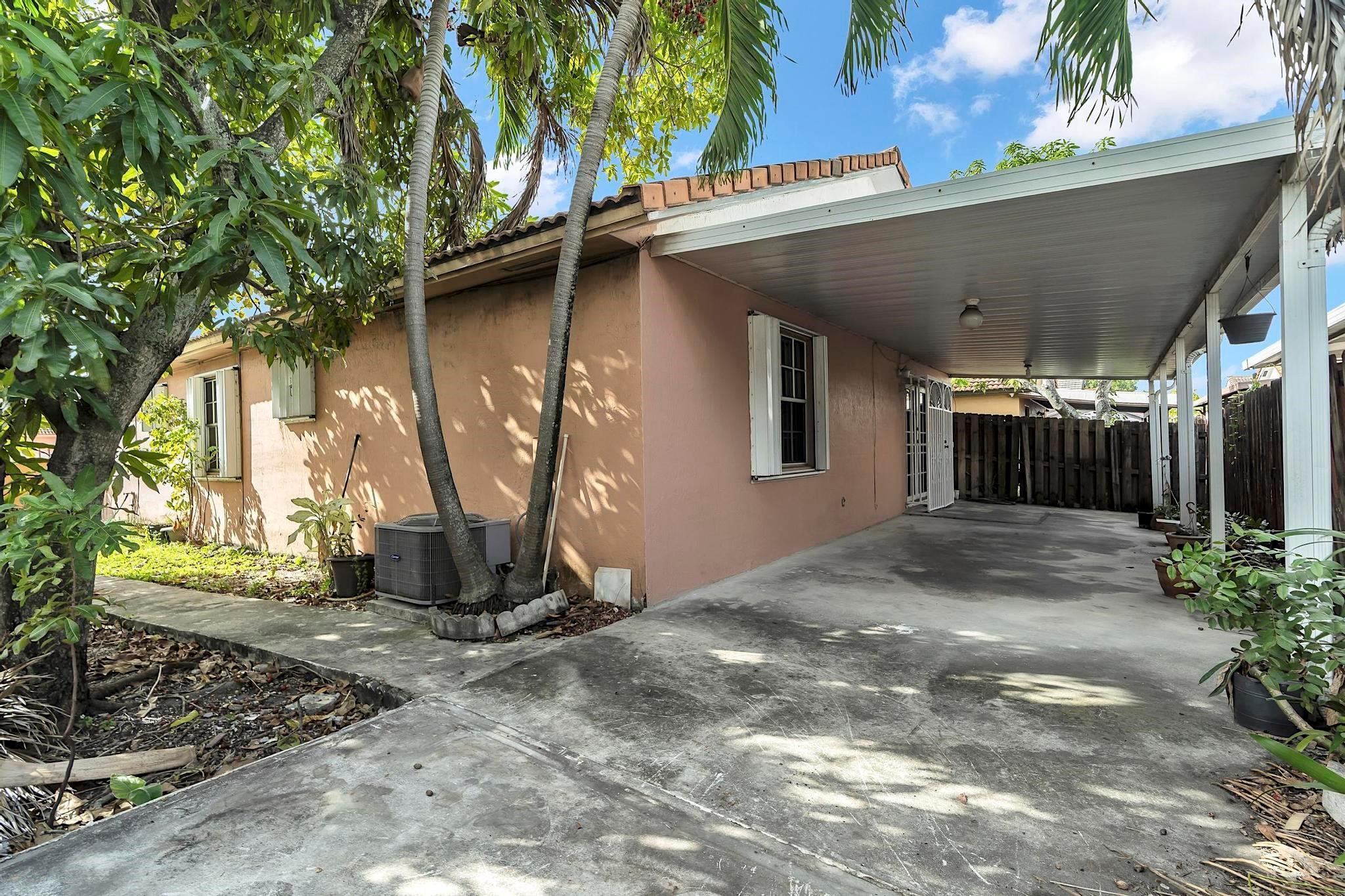 3201 West 76th Street Hialeah, FL 33018 - Photo 43 of 46 a view of a house with a tree