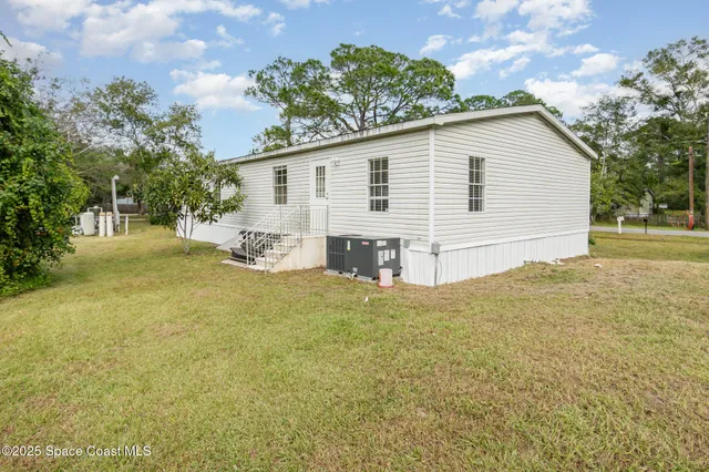 a view of an ocean with a house