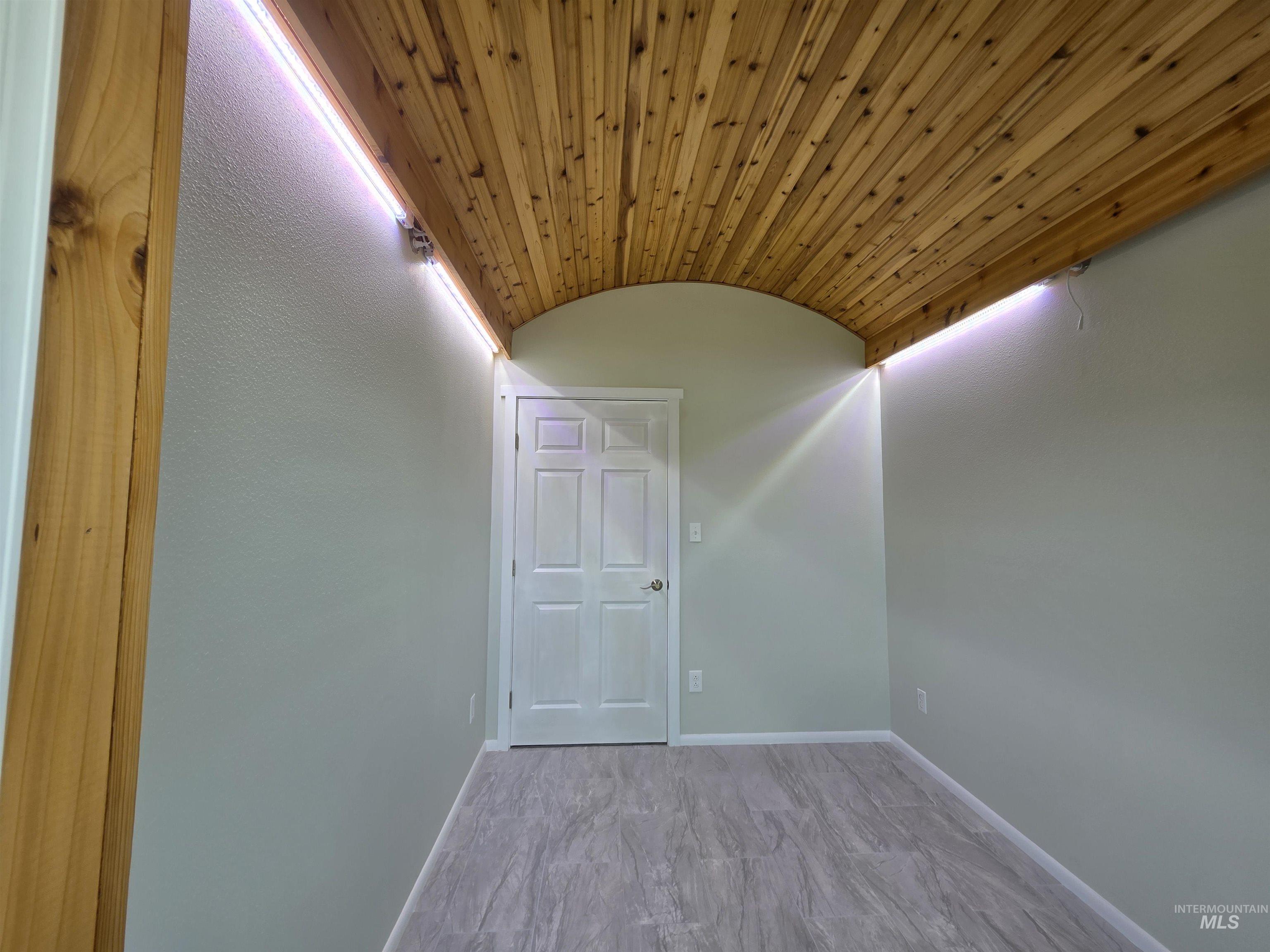 107 Pine Road Kamiah, ID 83536 - Photo 40 of 41 Wood-paneled barrel ceiling with integrated lighting