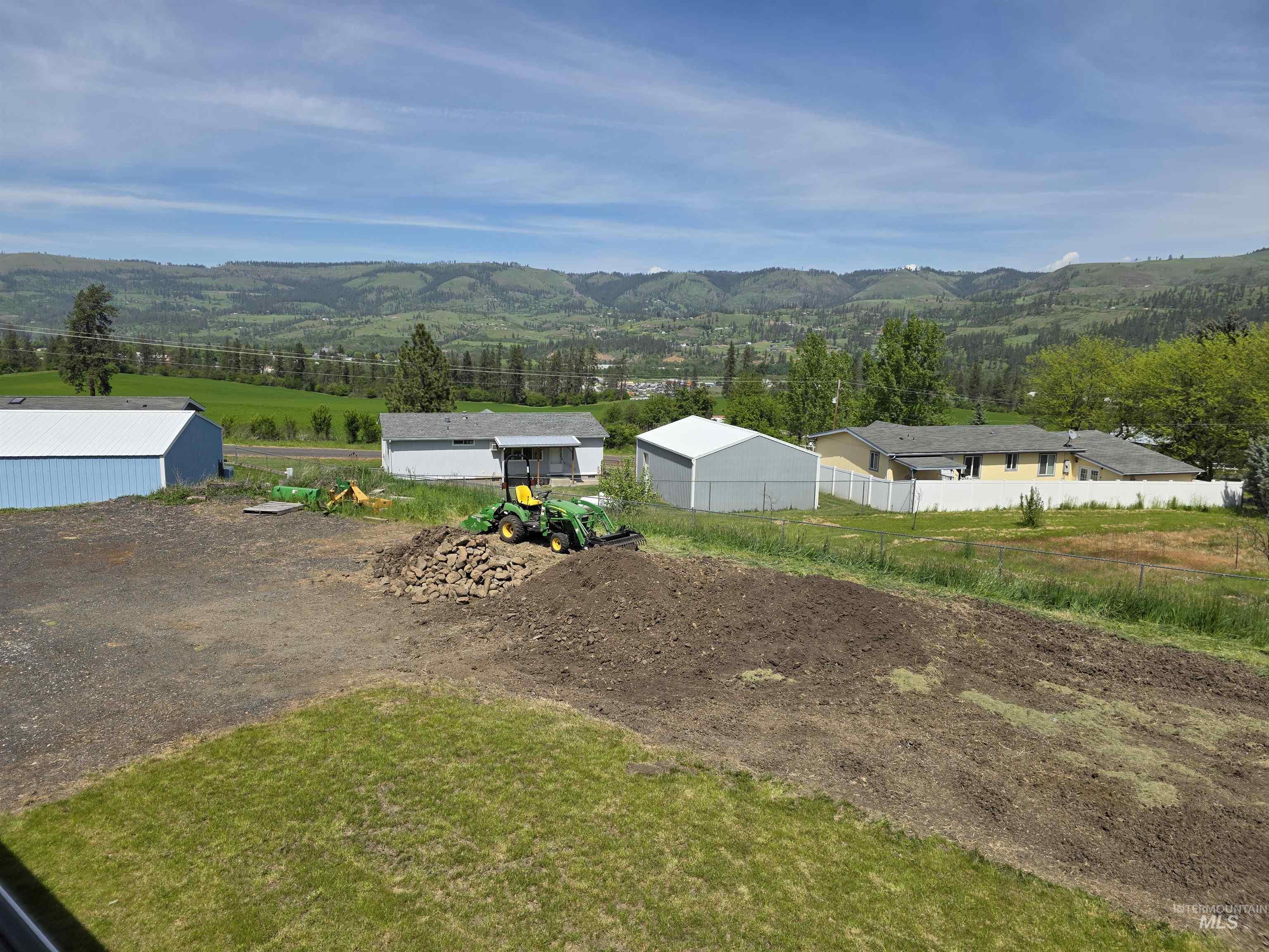 107 Pine Road Kamiah, ID 83536 - Photo 4 of 41 Expansive property featuring graded earth, a partially turfed area, and distant mountain scenery