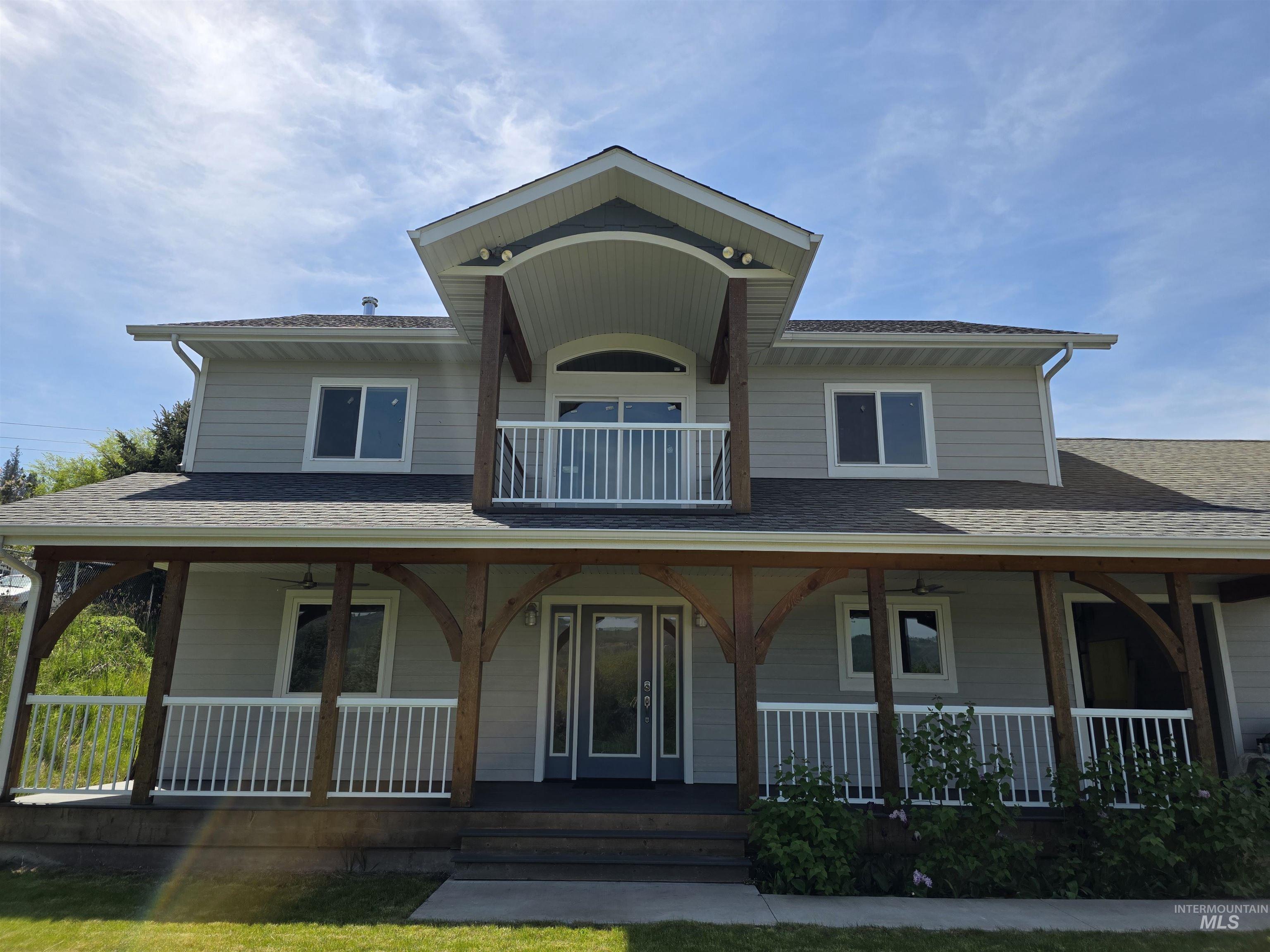 107 Pine Road Kamiah, ID 83536 - Photo 41 of 41 Two-story residence featuring light gray siding with white trim accents